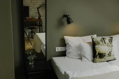 Łóżko lub łóżka w pokoju w obiekcie Villa Antiqua