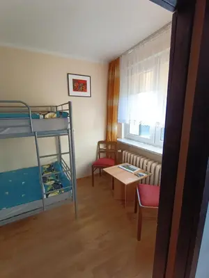 Łóżko lub łóżka w pokoju w obiekcie Mieszkanie w centrum