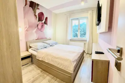 Łóżko lub łóżka w pokoju w obiekcie Polanica Luxury Apartment - Bliżej Zdroju