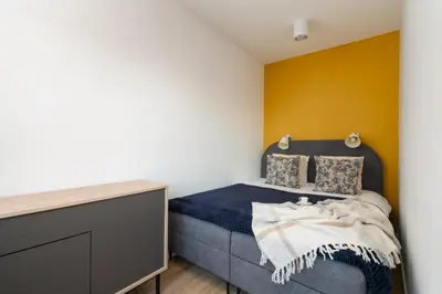 Łóżko lub łóżka w pokoju w obiekcie Pure Home Apartments - Gwiaździsta