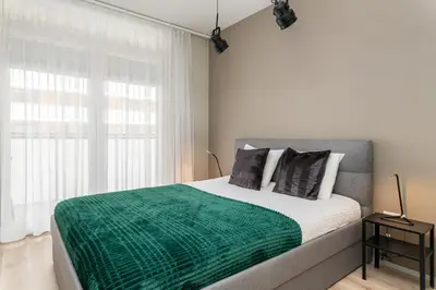 Łóżko lub łóżka w pokoju w obiekcie Pure Home Apartments - Gwiaździsta