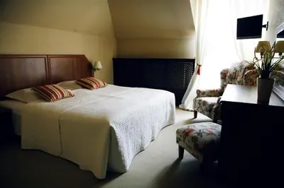 Łóżko lub łóżka w pokoju w obiekcie Hotel Zorza