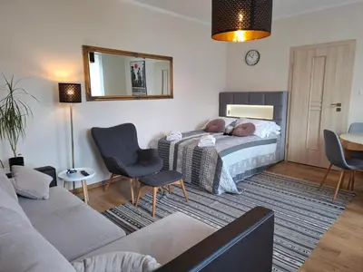 Łóżko lub łóżka w pokoju w obiekcie Apartament Nectar Pond