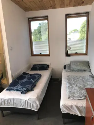 Łóżko lub łóżka w pokoju w obiekcie Kwatery Mamma Mia Opawska 1a