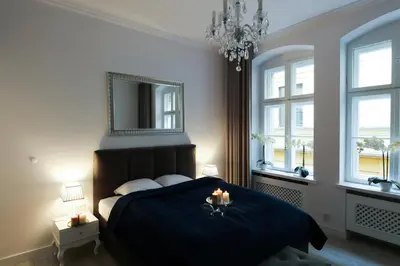 Łóżko lub łóżka w pokoju w obiekcie KDRO Apartment Rynek