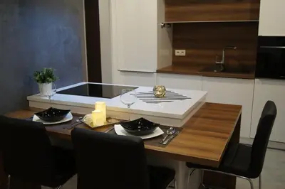 Kuchnia lub aneks kuchenny w obiekcie KOMFORT HOUSE RYNEK