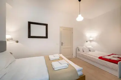 Łóżko lub łóżka w pokoju w obiekcie Apartament Villa Clara