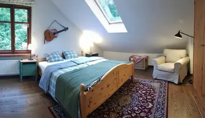 Łóżko lub łóżka w pokoju w obiekcie Apartament Międzygórze