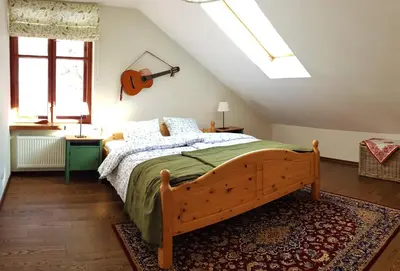 Łóżko lub łóżka w pokoju w obiekcie Apartament Międzygórze