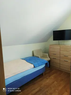 Łóżko lub łóżka w pokoju w obiekcie Apartamenty Golden Village