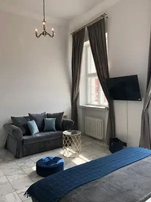 Łóżko lub łóżka w pokoju w obiekcie APARTAMENT 6 Rynek