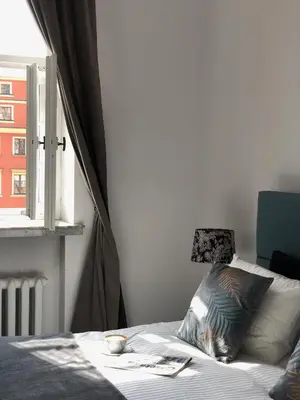 Łóżko lub łóżka w pokoju w obiekcie APARTAMENT 6 Rynek