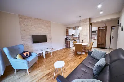 Telewizja i/lub zestaw kina domowego w obiekcie LAGUNA Apartament 23 Willa Maria