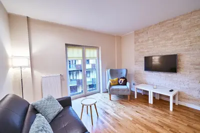 Telewizja i/lub zestaw kina domowego w obiekcie LAGUNA Apartament 23 Willa Maria