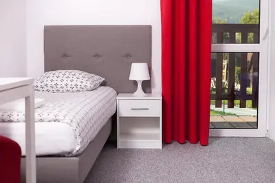 Łóżko lub łóżka w pokoju w obiekcie Villa Rosa