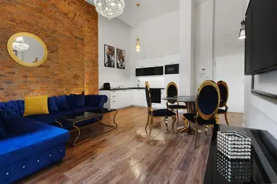 Telewizja i/lub zestaw kina domowego w obiekcie Prestige Apartments 12