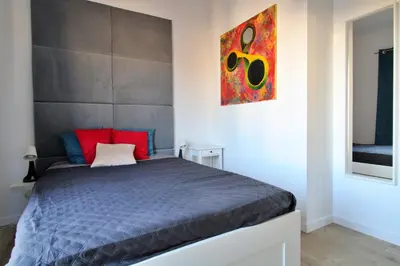 Łóżko lub łóżka w pokoju w obiekcie Kościuszki 130 C TectumApartments