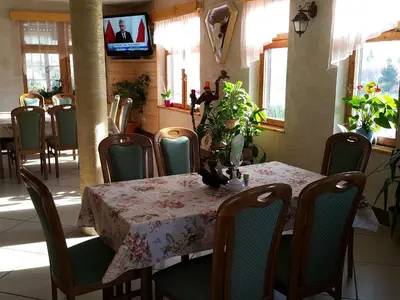 Telewizja i/lub zestaw kina domowego w obiekcie Zajazd Byczy Róg
