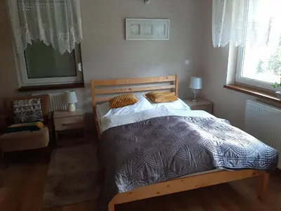 Łóżko lub łóżka w pokoju w obiekcie GÓRSKI PROMYK