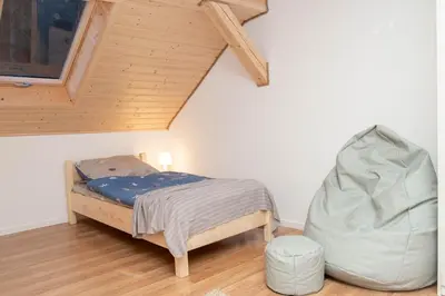 Łóżko lub łóżka w pokoju w obiekcie Apartamenty GoszoWita