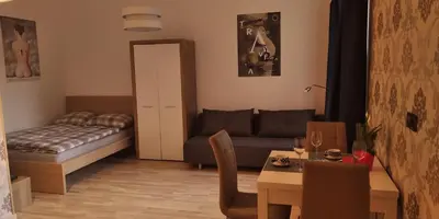Łóżko lub łóżka w pokoju w obiekcie Apartament Kosciuszki