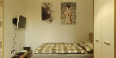 Łóżko lub łóżka w pokoju w obiekcie Apartament Kosciuszki