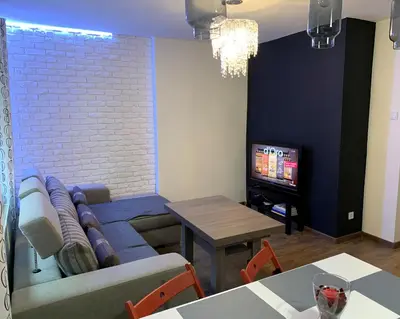 Telewizja i/lub zestaw kina domowego w obiekcie Apartament rodzinny 70 m2