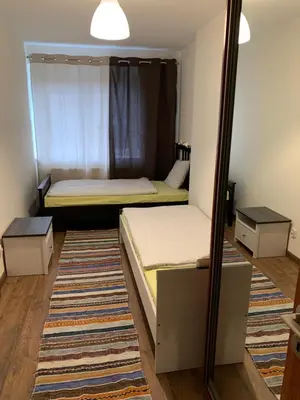 Łóżko lub łóżka w pokoju w obiekcie Apartament rodzinny 70 m2