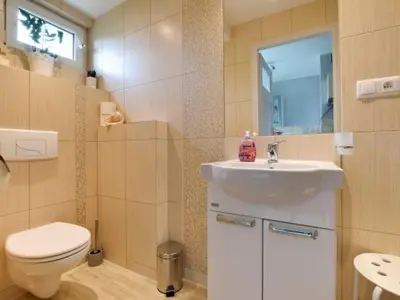 Łazienka w obiekcie Apartament w Mieście