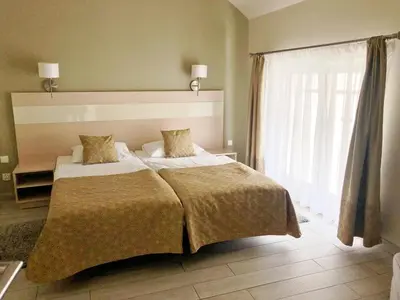 Łóżko lub łóżka w pokoju w obiekcie Atrakcyjny Apartament Czarna Góra