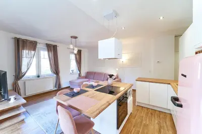 Kuchnia lub aneks kuchenny w obiekcie LAGUNA 22 Apartament Różowy