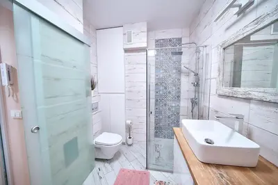 Łazienka w obiekcie LAGUNA 22 Apartament Różowy