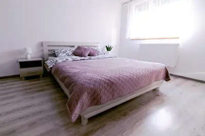 Łóżko lub łóżka w pokoju w obiekcie Apartament u Andrzeja