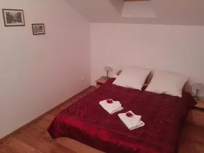 Łóżko lub łóżka w pokoju w obiekcie Zajazd Idylla