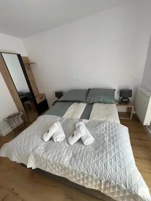 Łóżko lub łóżka w pokoju w obiekcie SZWEDZKA22 PL Premium Rooms