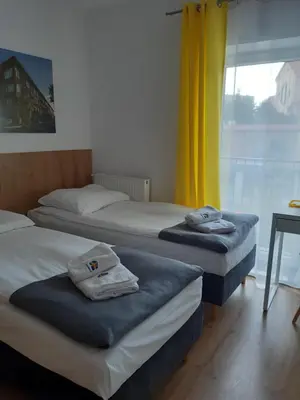 Łóżko lub łóżka w pokoju w obiekcie SZWEDZKA22 PL Premium Rooms