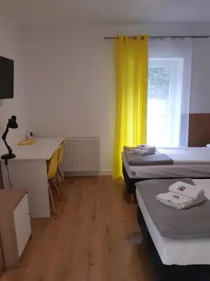 Łóżko lub łóżka w pokoju w obiekcie SZWEDZKA22 PL Premium Rooms