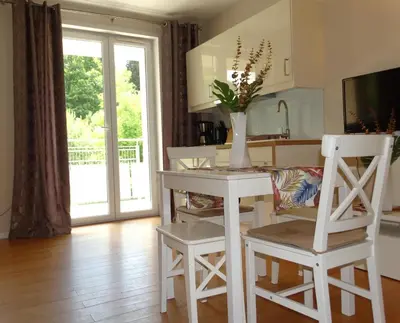 Telewizja i/lub zestaw kina domowego w obiekcie Apartamenty Miku
