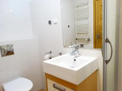 Łazienka w obiekcie Apartamenty Miku