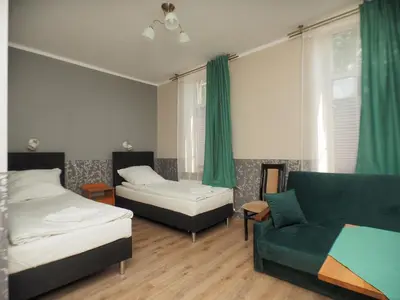 Łóżko lub łóżka w pokoju w obiekcie Willa Luna
