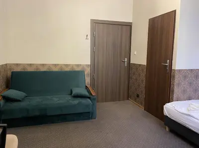 Łóżko lub łóżka w pokoju w obiekcie Willa Luna