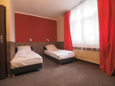 Łóżko lub łóżka w pokoju w obiekcie Willa Luna