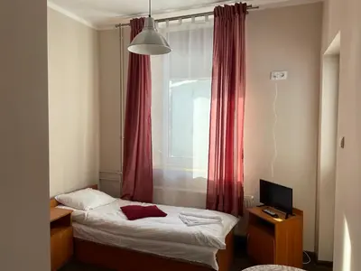 Łóżko lub łóżka w pokoju w obiekcie Willa Luna