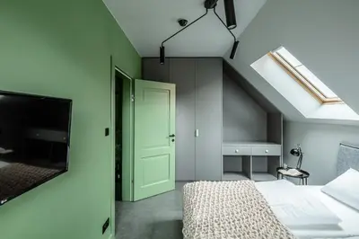 Łóżko lub łóżka w pokoju w obiekcie Apartamenty Caminski Deluxe