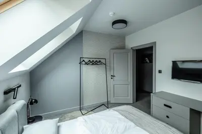 Łóżko lub łóżka w pokoju w obiekcie Apartamenty Caminski Deluxe