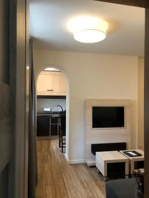 Telewizja i/lub zestaw kina domowego w obiekcie Arte-locum Apartamenty przy Rynku