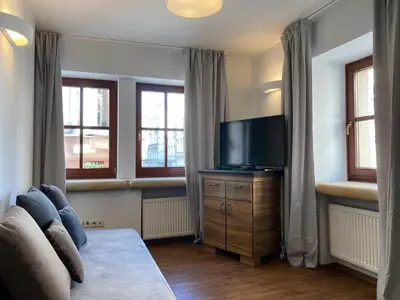 Telewizja i/lub zestaw kina domowego w obiekcie Arte-locum Apartamenty przy Rynku