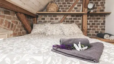 Łóżko lub łóżka w pokoju w obiekcie Zapomnienie