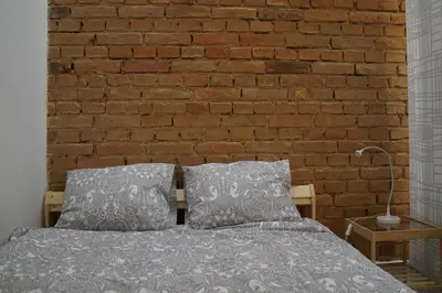 Łóżko lub łóżka w pokoju w obiekcie Apartament Gliwice Centrum Fredry II