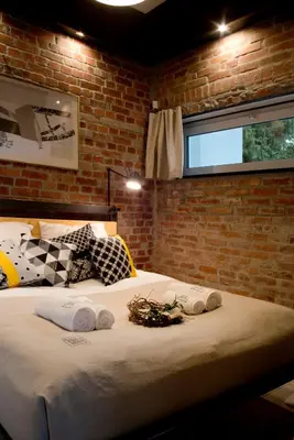 Łóżko lub łóżka w pokoju w obiekcie Apartamenty Folwark Boguszyn